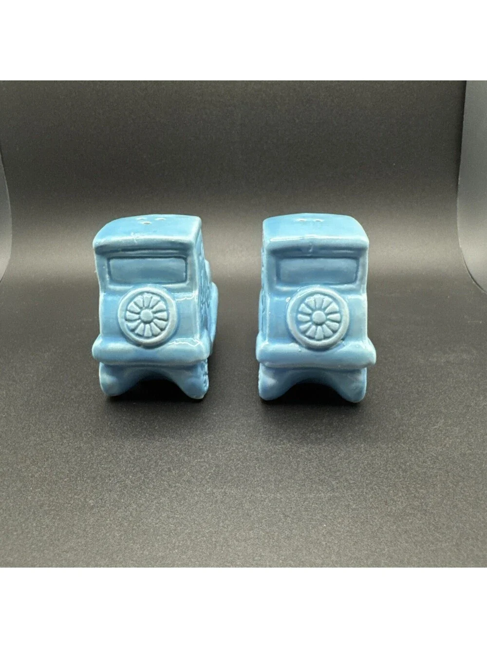 N/A add a dash of vintage charm to your dining experience with these ceramic blue car salt and pepper shakers  originating from japan in the 1960s